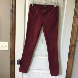 Express plum colored skinny jeans